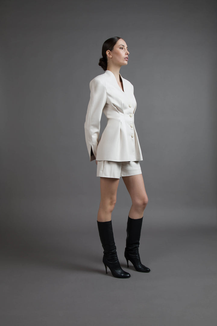 GIACCA COUTURE IN ECOPELLE CON BOTTONI