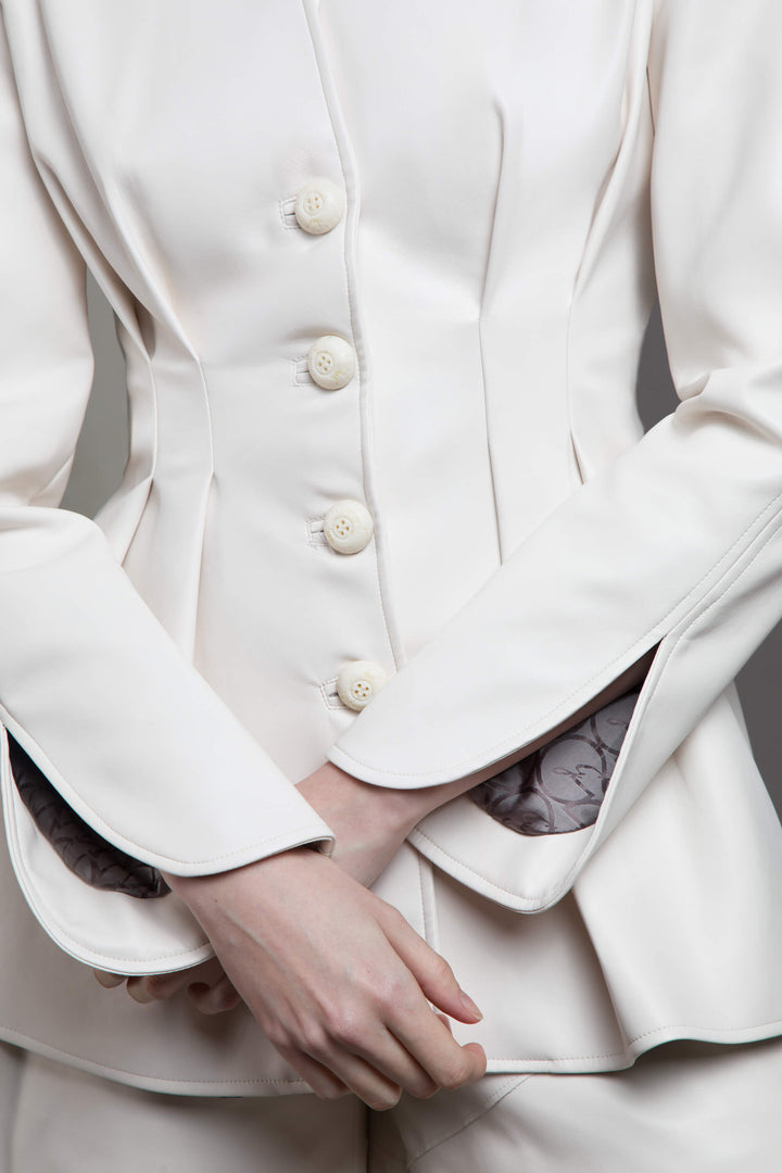 GIACCA COUTURE IN ECOPELLE CON BOTTONI